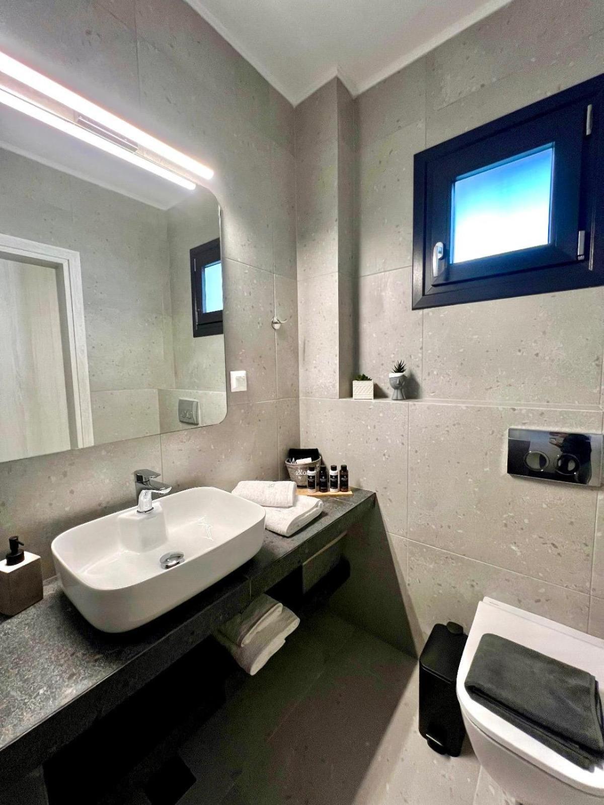 Four Shades Luxury Suites Sarti Exterior foto